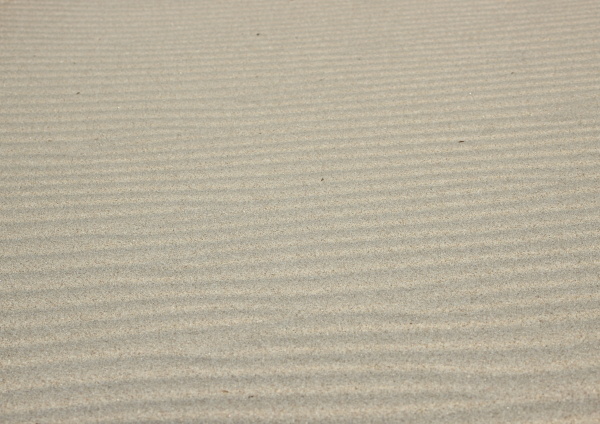 isolierte horizontale sandwellentextur am strand