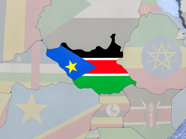 suedsudan mit flagge auf dem globus