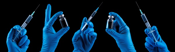 handhaltespritze mit impfstoff gegen coronavirus