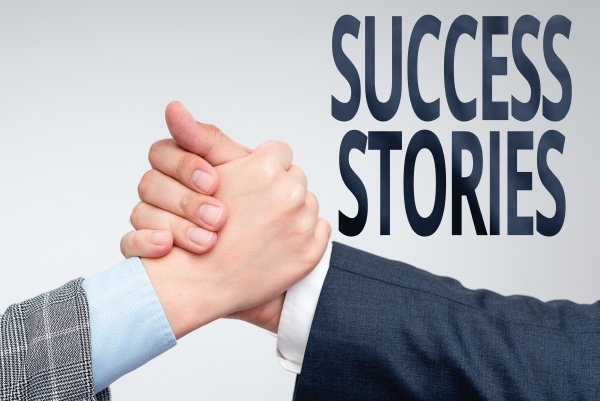 textschild mit success stories business