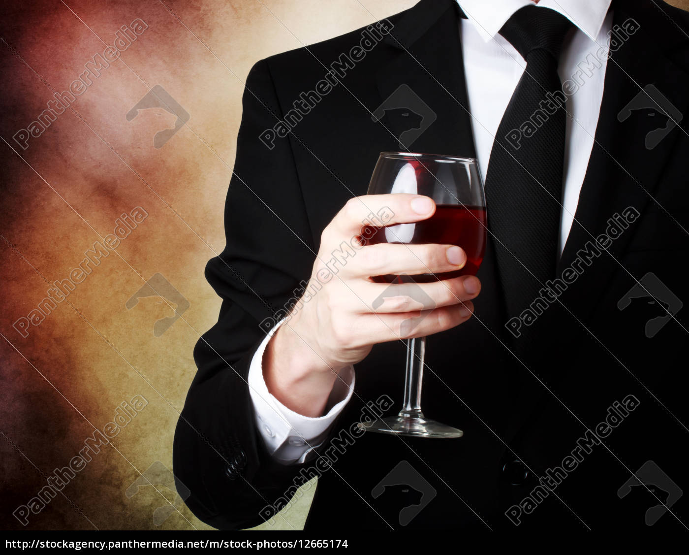 Junger Mann Mit Einem Glas Rotwein Stock Photo Bildagentur Panthermedia