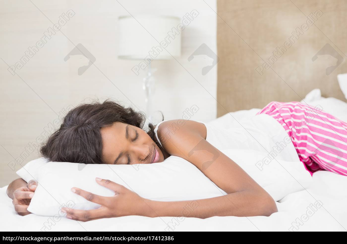 Stock Bild 17412386 Beautiful Young Woman Lying On Bed