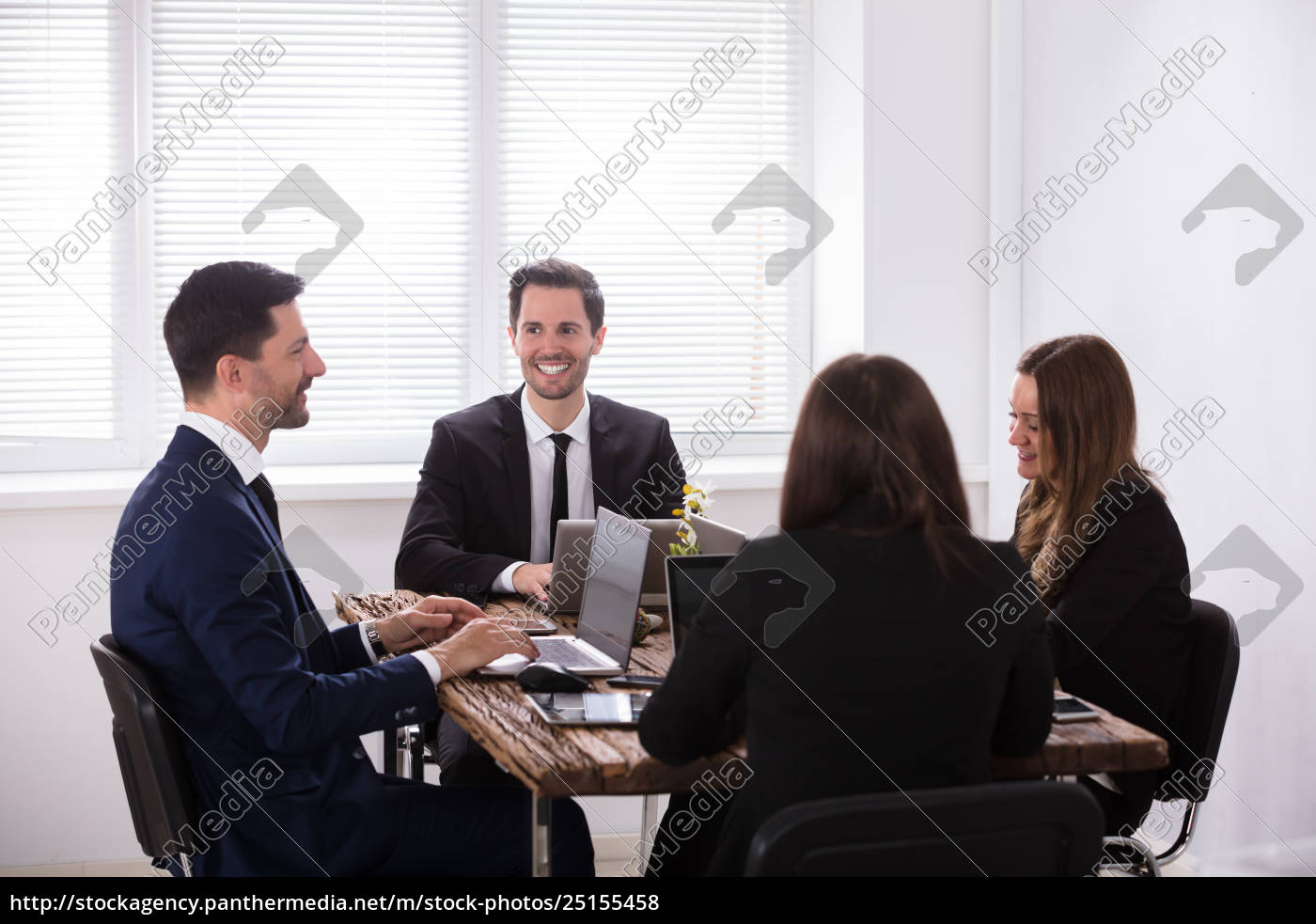 Businesspeople Attending Meeting In Office - Stock Photo - #25155458 ...